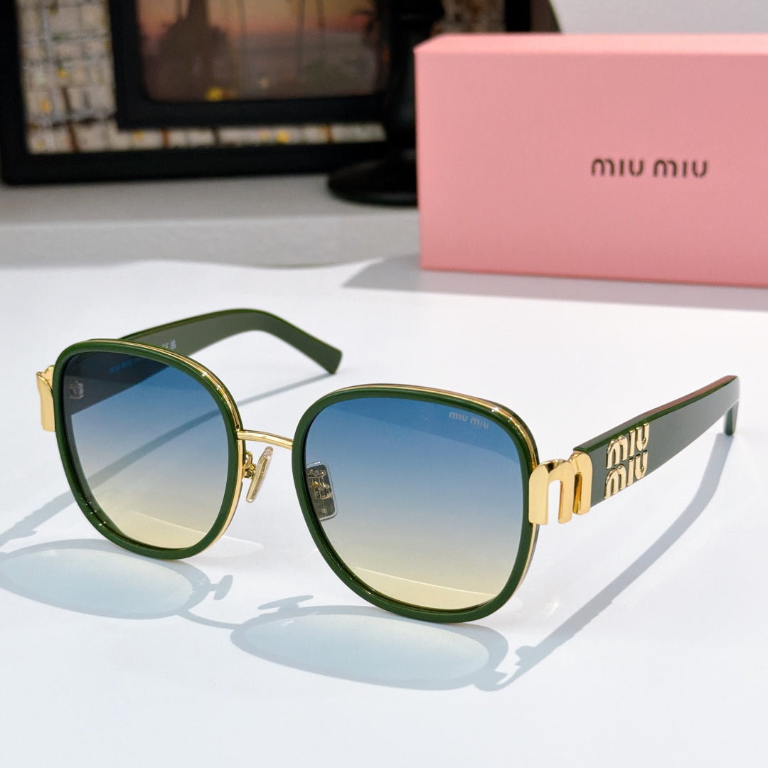 MiuMiu cat-eye sunglasses with dark green frame and blue tinted lenses, gold accents