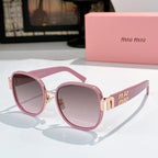 MiuMiu cat-eye sunglasses with pink frame and mauve tinted lenses, gold accents