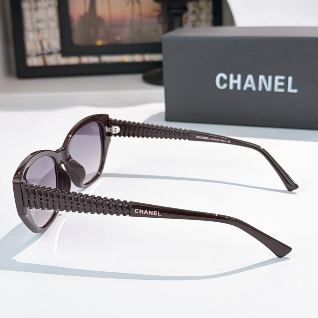 CHANEL dark sunglasses side view with textured temples and tinted lenses