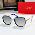 Cartier sunglasses with blue frames, gold details, and gradient blue lenses