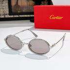 Round sunglasses with silver-tone metal rims and light tinted lenses.