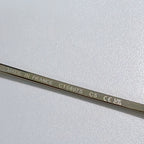 Sunglasses temple engraved with “MADE IN FRANCE” and model code text.