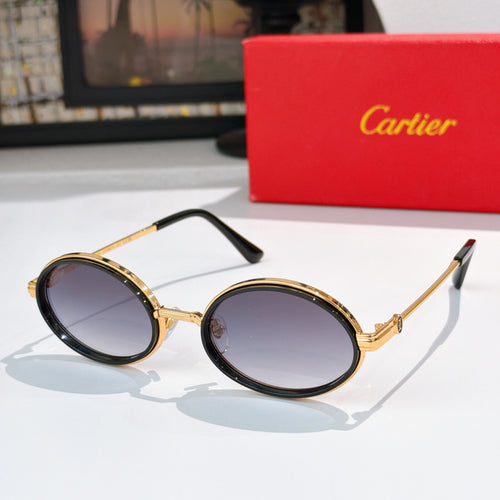 Round sunglasses with black rims and gold-tone metal, tinted dark lenses.