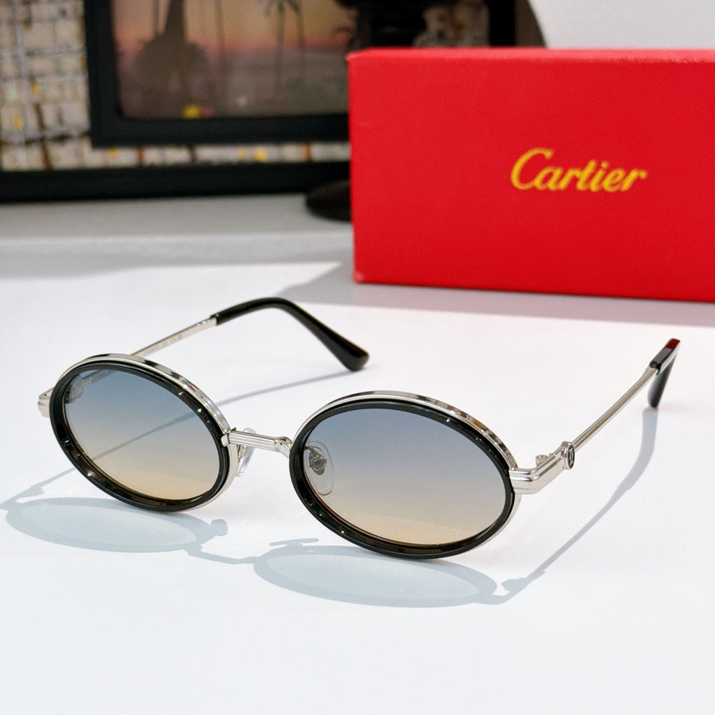 Round sunglasses with dark rims and silver-tone metal, tinted lenses.