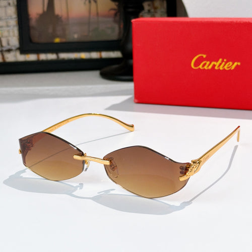 Cartier glasses with warm brown lenses and gold frame, angular cat-eye shape