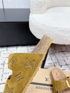 Louis Vuitton mustard sandal with buckle strap and textured logo insole