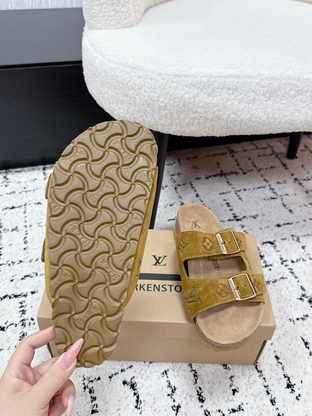 Louis Vuitton mustard sandals with patterned outsole side on shoe box