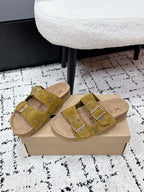 Louis Vuitton mustard slide sandals with two buckled straps and cork footbed