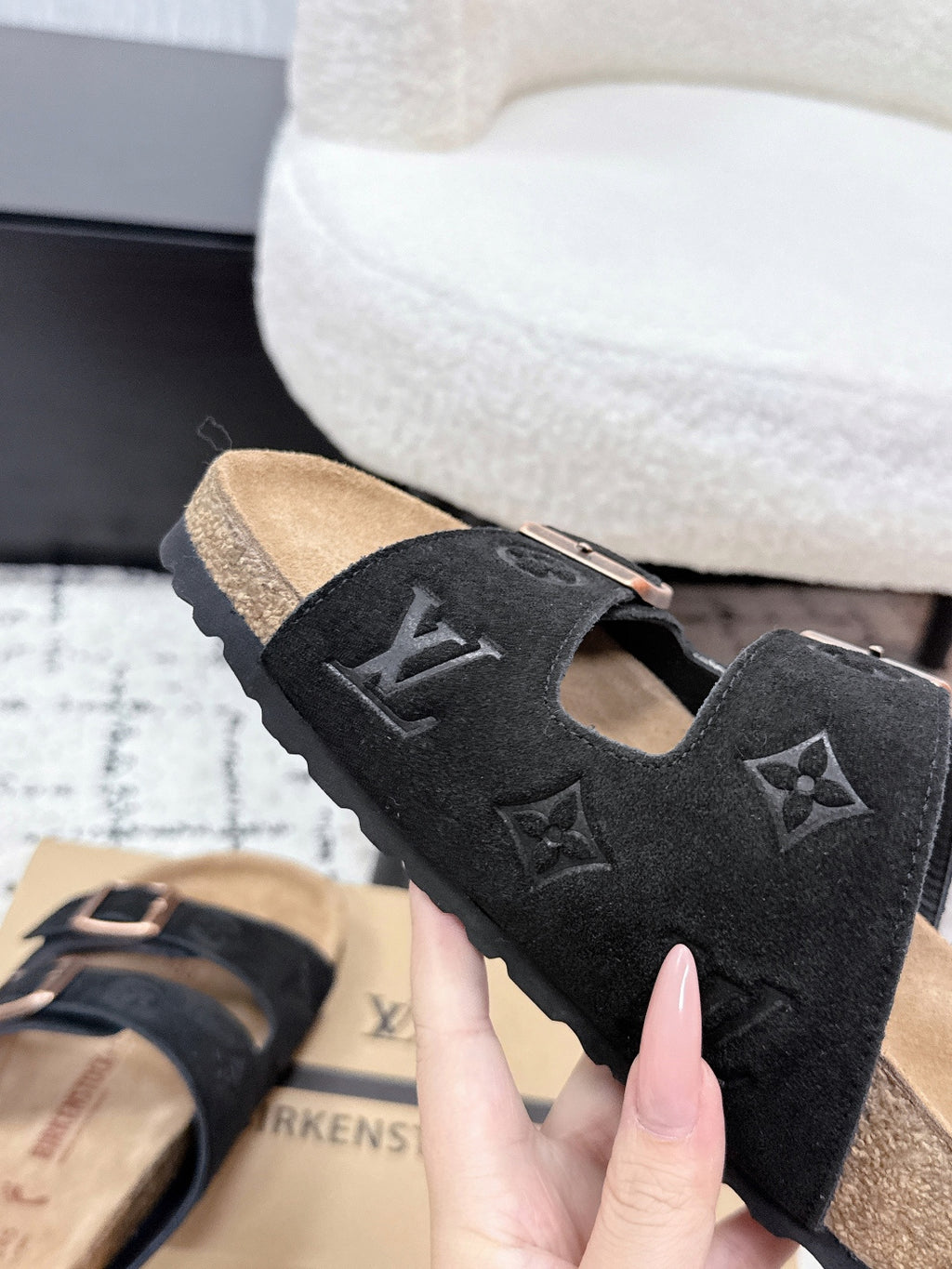 Louis Vuitton slide sandals, black suede with LV monogram and two metal buckles