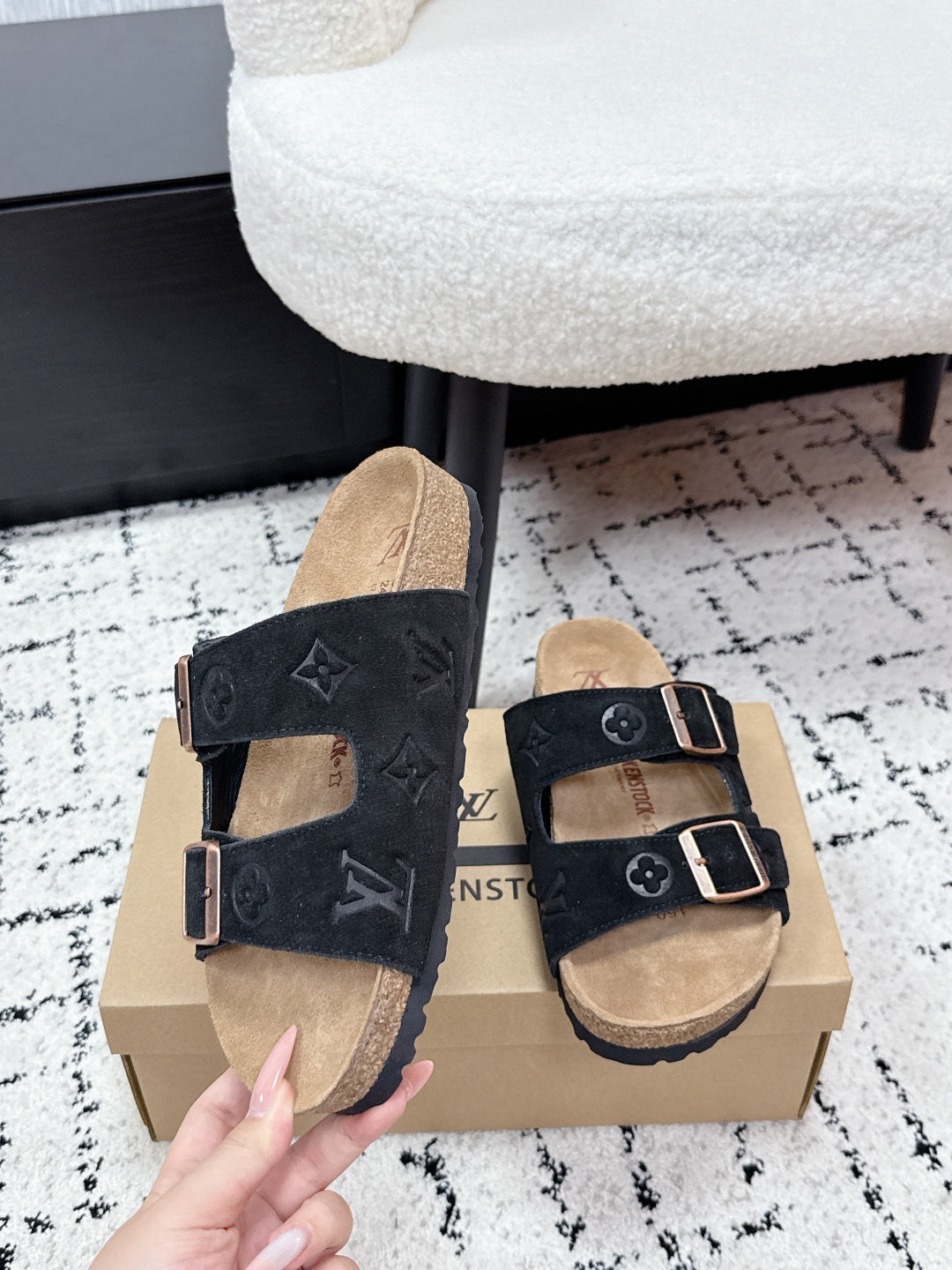 Louis Vuitton slide sandals, black suede with two buckled straps and tan lining