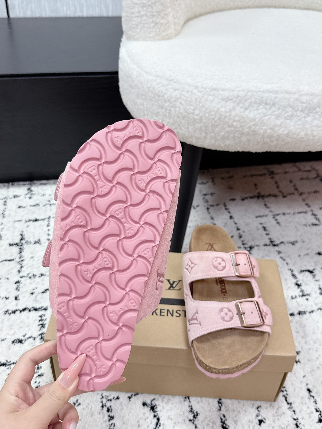 Louis Vuitton pink sandal outsole and footbed, showing embossed pattern