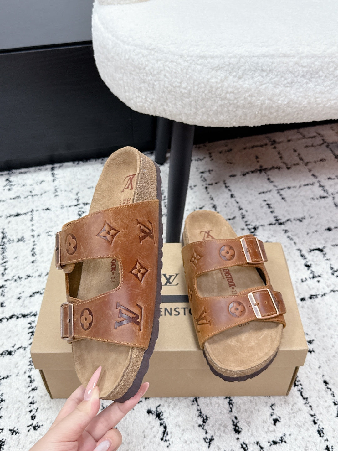 Tan Louis Vuitton monogram slide sandals, front view with two buckle straps