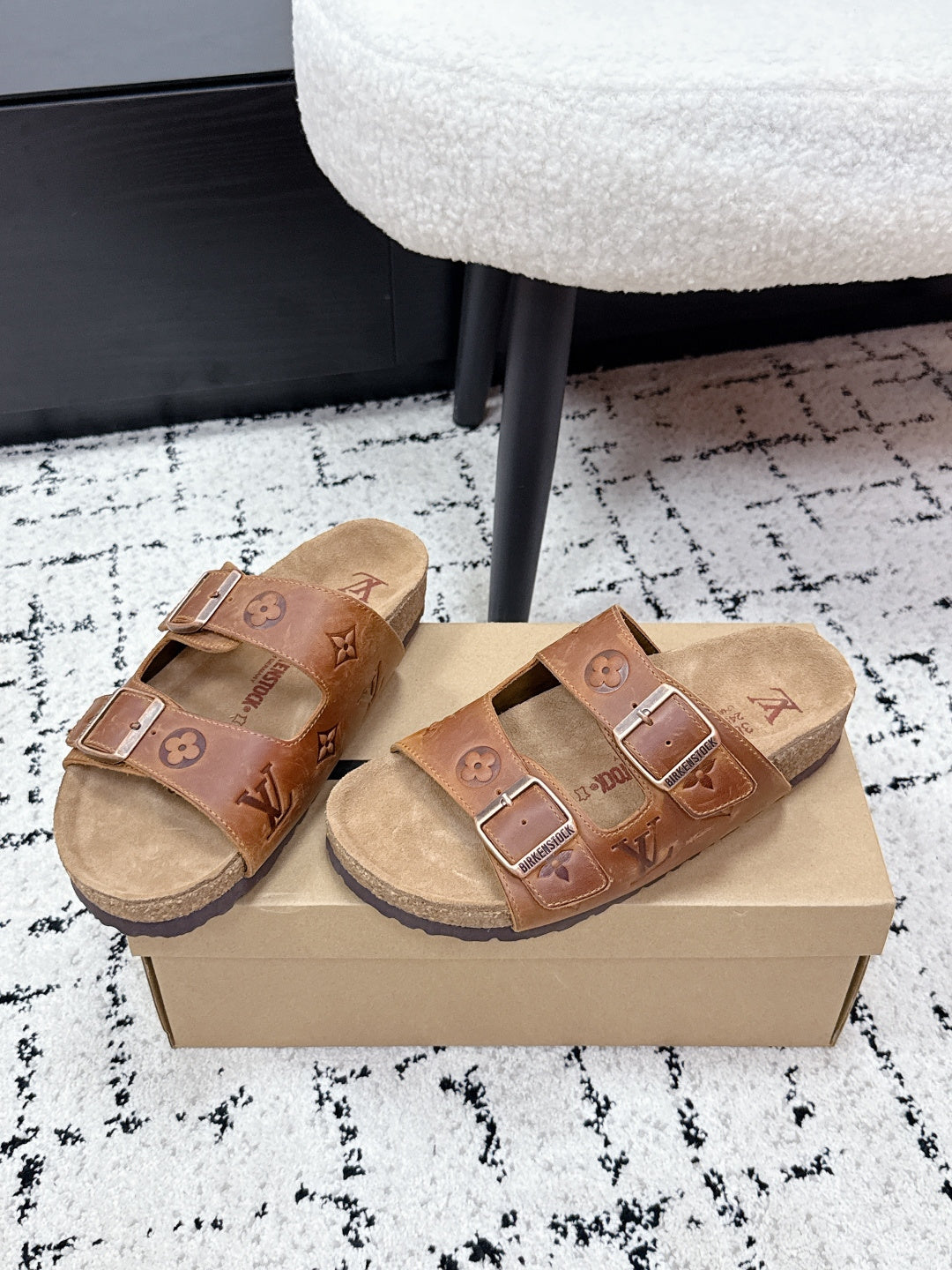 Tan Louis Vuitton monogram slide sandals with two buckle straps and footbed