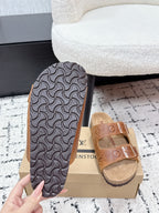 Black Louis Vuitton slide sandal outsole with textured geometric tread