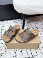 Louis Vuitton monogram slide sandals with two metal buckle straps, tan lining.