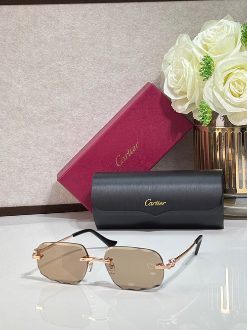 Rectangular gold-tone Cartier eyeglass frame with light tan lenses and black temples