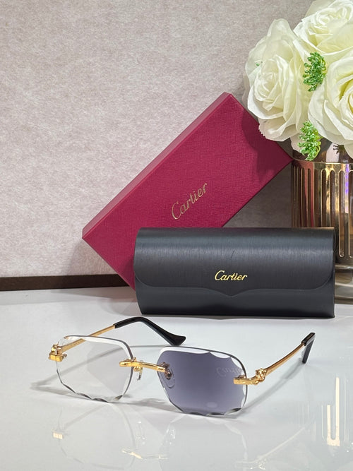 Cartier eyeglasses with gold rectangular frames and blue gradient lenses, black temple tips