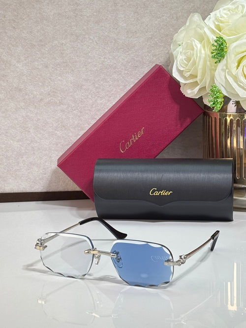 Cartier eyeglasses with gold rectangular frames and blue-tinted lenses, black temple tips