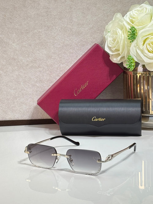 Cartier eyeglasses with gold temples and clear rectangular lenses