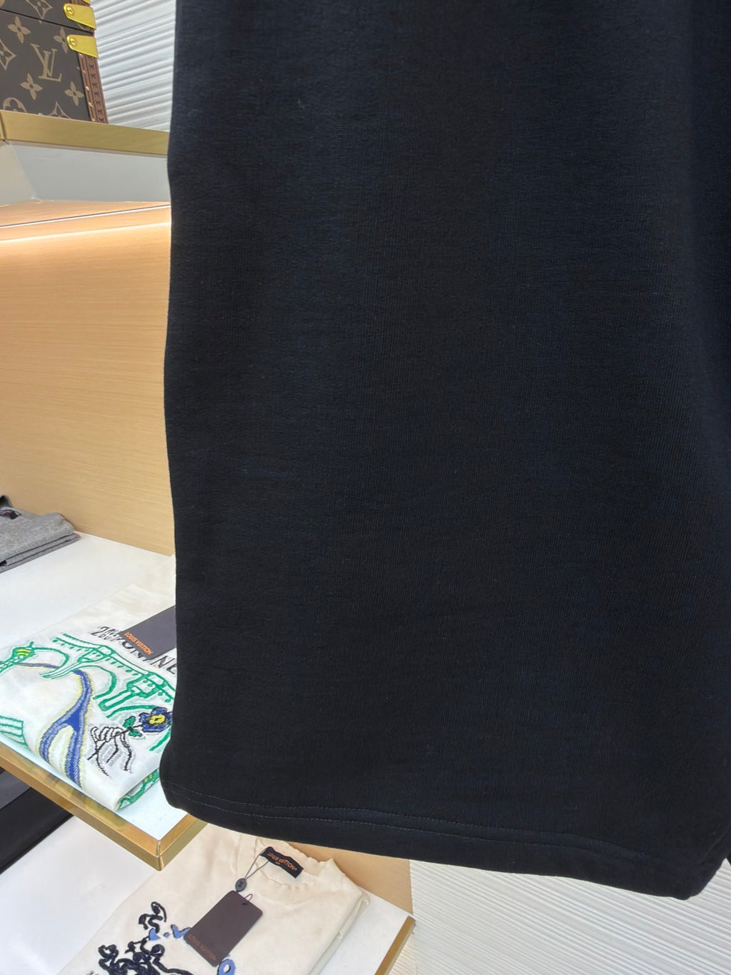 Dark shorts with smooth fabric and drawstring waist detail