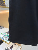 Dark shorts with smooth fabric and drawstring waist detail