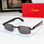 Sunglasses with dark gray lenses, black frame, and gold metal arms.