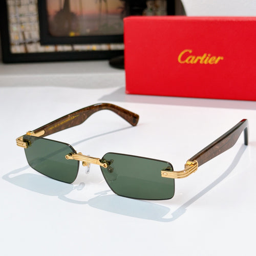 Sunglasses with dark green lenses, tortoise temples, and gold metal arms.