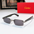 Sunglasses with dark gray lenses and black frame with silver metal arms.