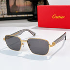 Cartier sunglasses with gray lenses and gold-tone frames