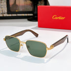 Cartier sunglasses with green lenses and gold-tone frames