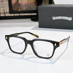 Black eyeglasses with gold-tone temple accents and clear lenses, full-rim style