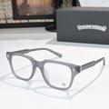 Light gray eyeglasses with full-rim frames and clear lenses, diamond-style temple detailing
