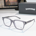 Light gray eyeglasses with full-rim frames and clear lenses, diamond-style temple detailing