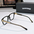 Black eyeglasses side profile with gold-tone temple accents and clear lenses