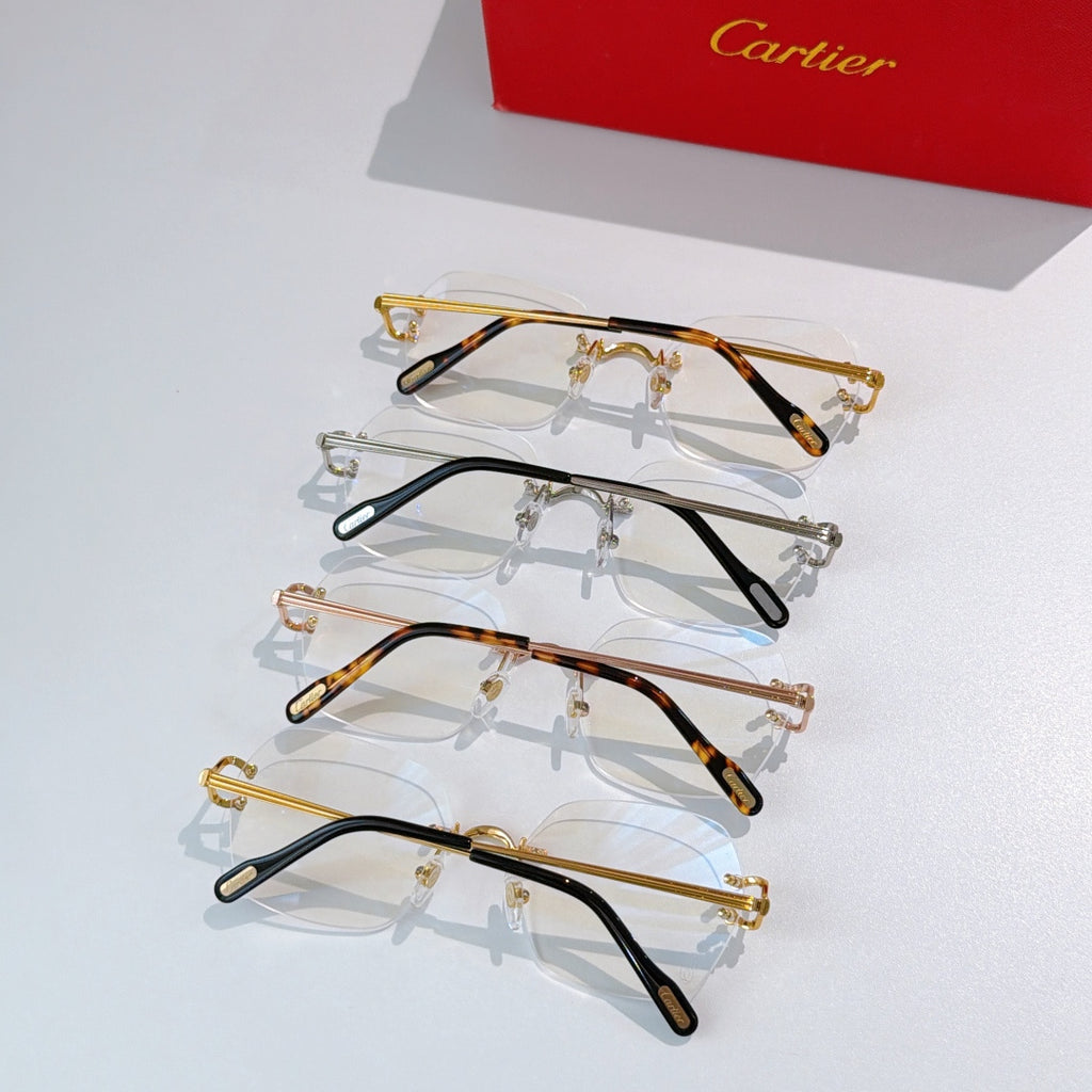 Assorted eyeglasses frames: gold-tone, tortoise, and black with clear lenses