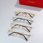 Assorted eyeglasses frames: gold-tone, tortoise, and black with clear lenses