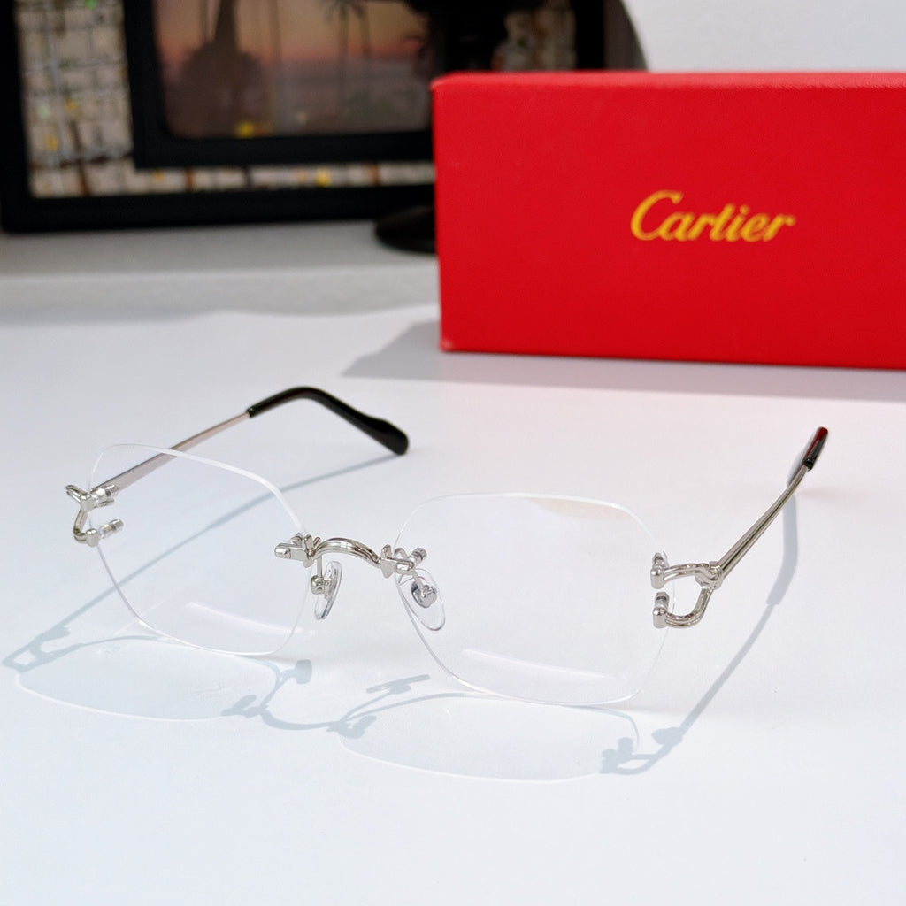 Silver-tone metal eyeglasses with clear lenses and dark temples
