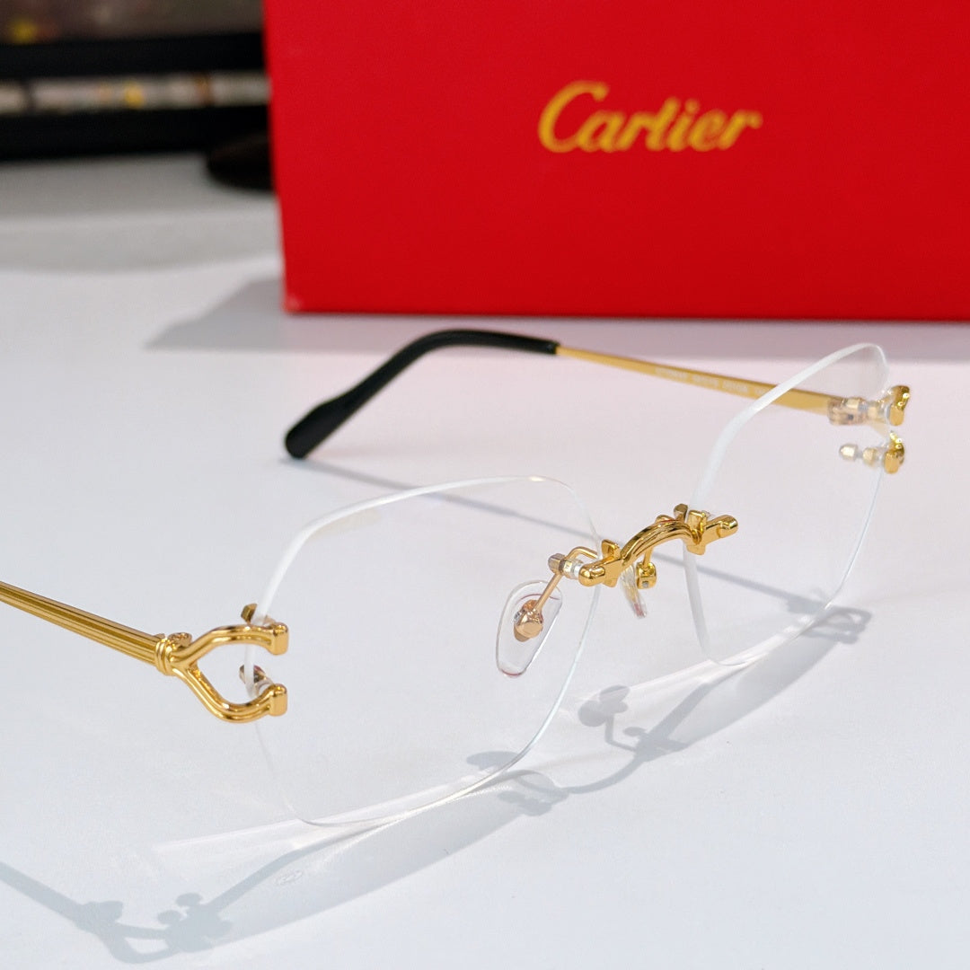 Gold-tone metal eyeglasses with clear lenses and black temple arms