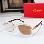 Cartier sunglasses with silver-tone patterned frame, tortoise temples, tinted brown lenses