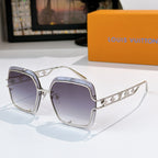 Silver-tone square sunglasses with dark purple lenses and logo detail on temples