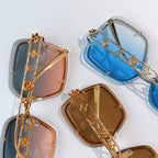 Assorted square sunglasses with star-cutout temples and peach and blue lenses