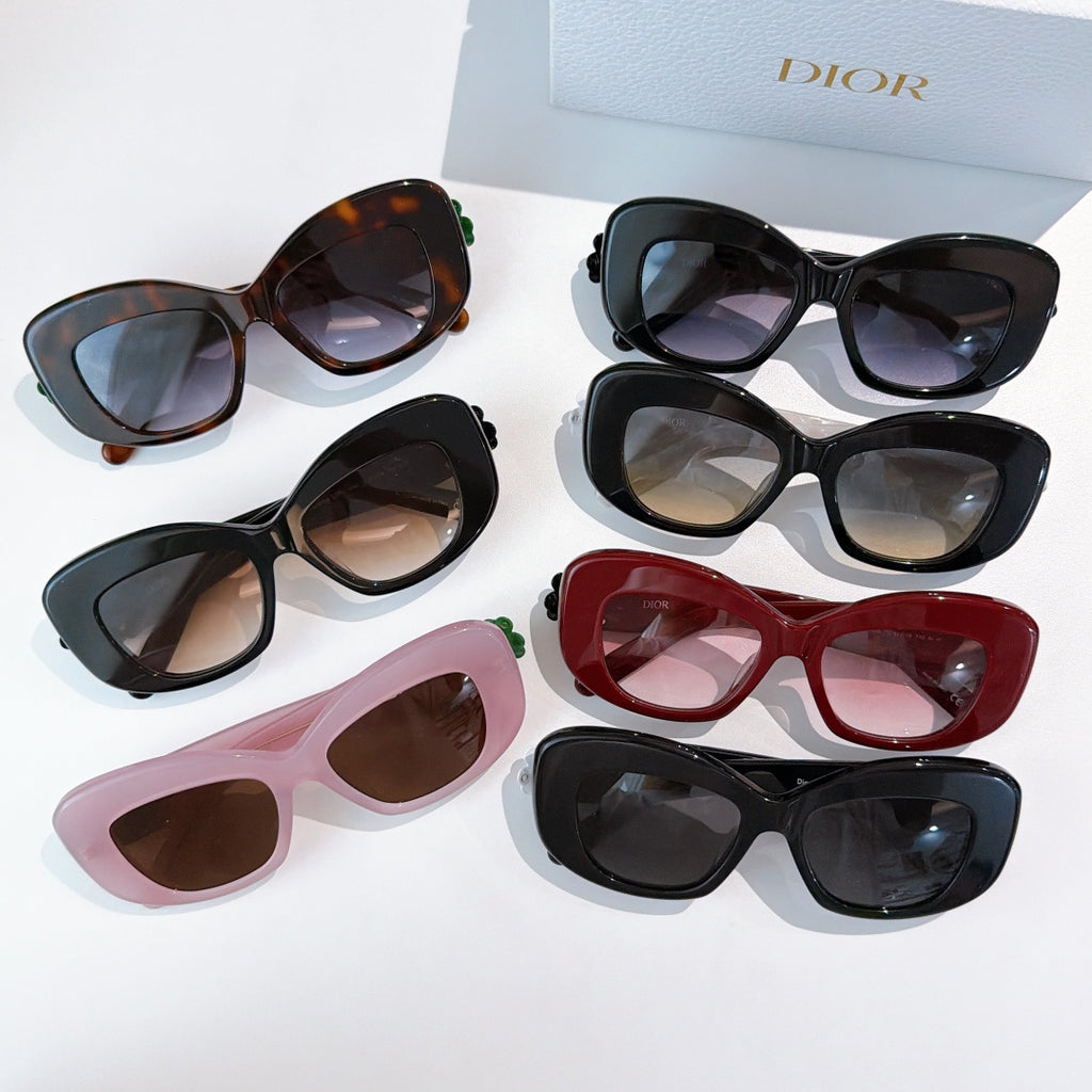 Assorted Dior sunglasses in mixed frame colors, each with tinted lenses