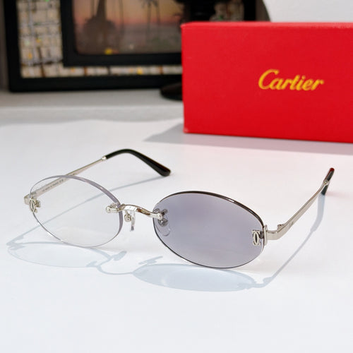 Cartier eyeglasses with clear silver frame, pale blue lenses, rounded rectangular design