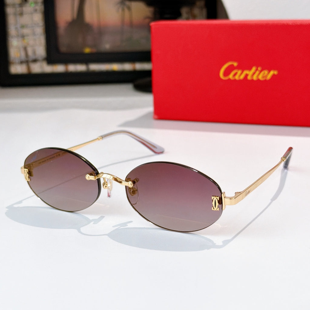 Cartier eyeglasses with gold frame and mauve tinted lenses, oval rounded silhouette