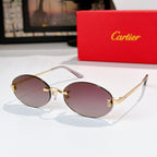 Cartier eyeglasses with gold frame and mauve tinted lenses, oval rounded silhouette