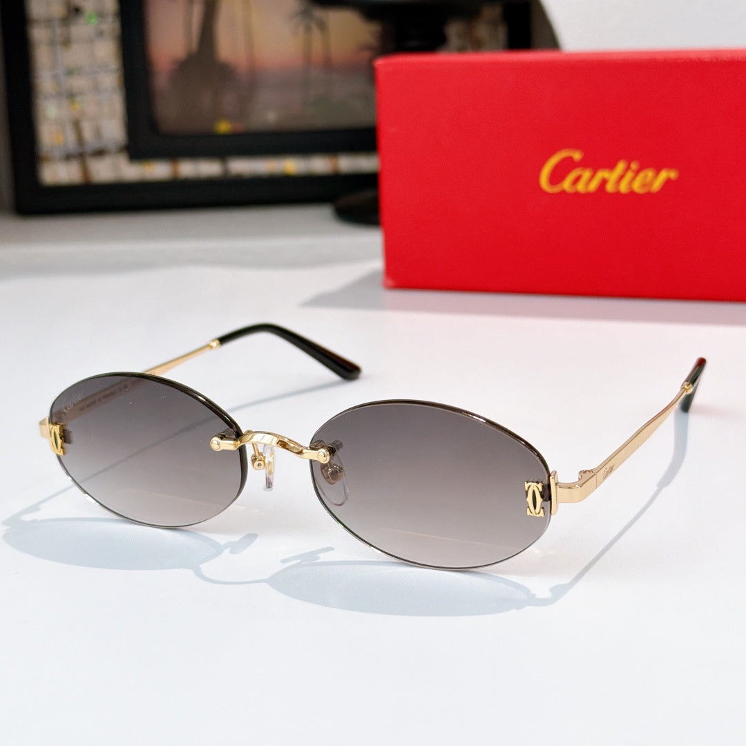 Cartier sunglasses with silver frame and dark lenses, rounded oval style