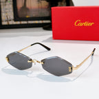 Cartier sunglasses with gold-tone frame and dark gray gradient lenses