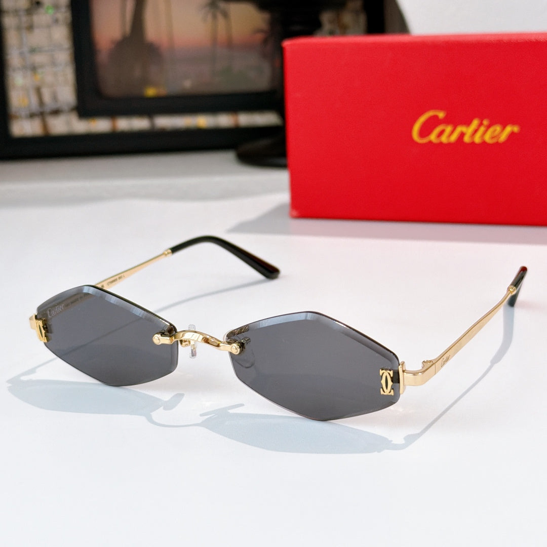 Cartier sunglasses with gold-tone frame and dark gray gradient lenses