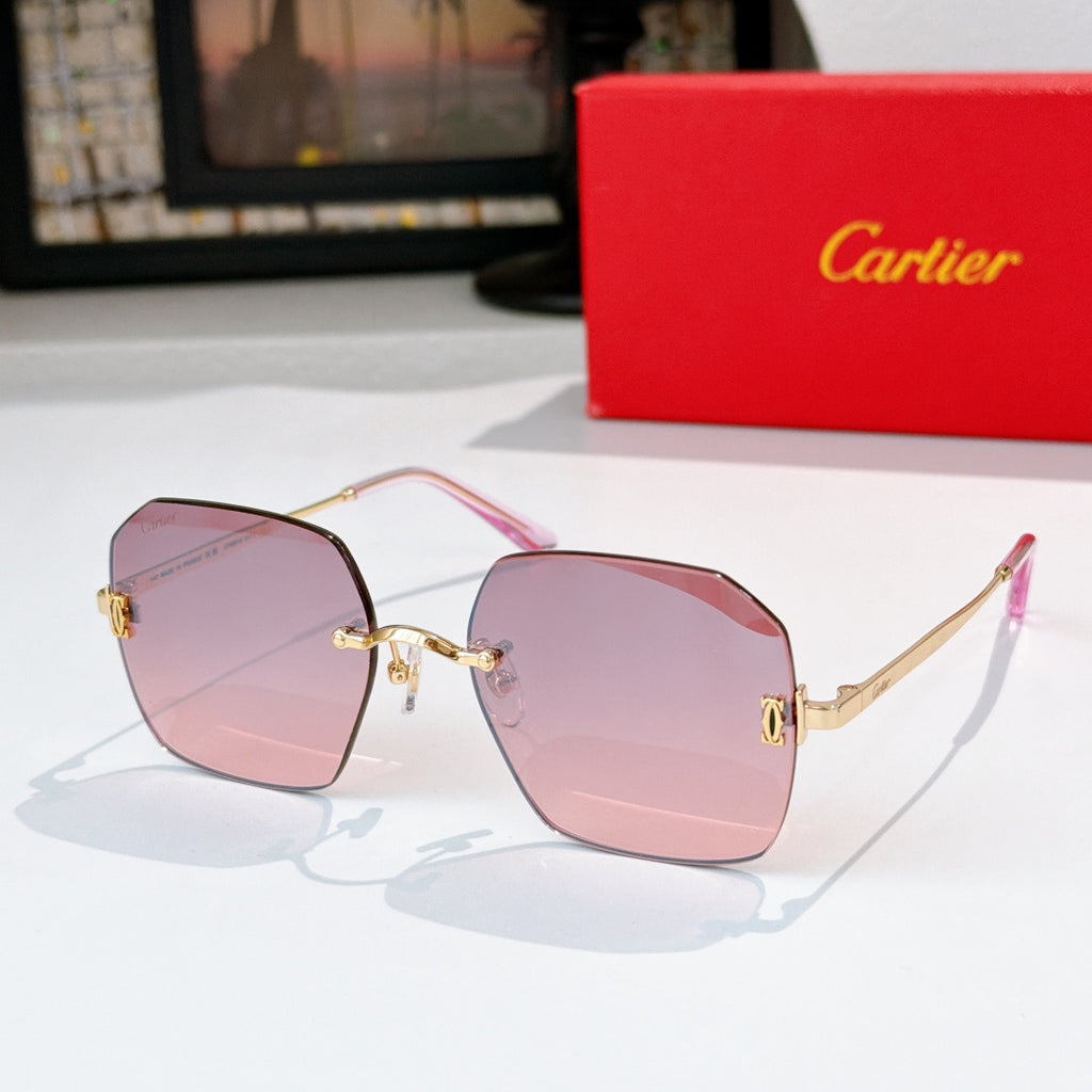Gold-tone metal glasses with pink tinted lenses, hexagonal frames and metal temples