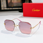 Gold-tone metal glasses with pink tinted lenses, hexagonal frames and metal temples